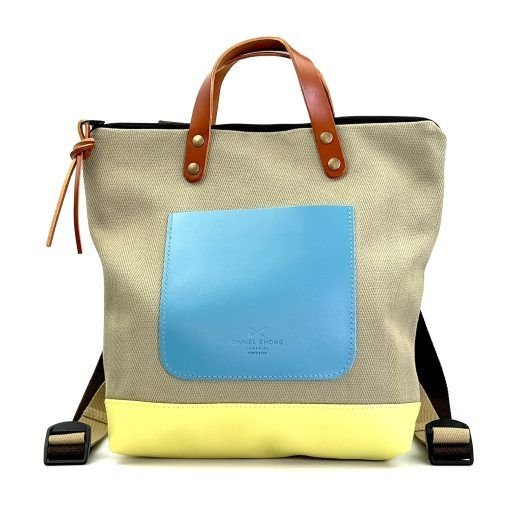 Mochila mini cuadrada azul y amarillo